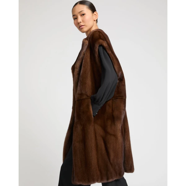 Woman wearing Yves Salomon shearling fur coat – luxury outerwear at Luxury Shoes 