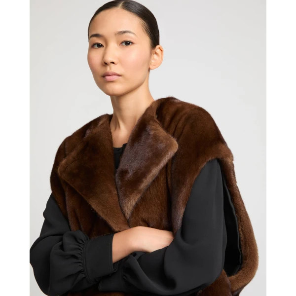 Woman wearing Yves Salomon shearling fur coat – luxury outerwear at Luxury Shoes 