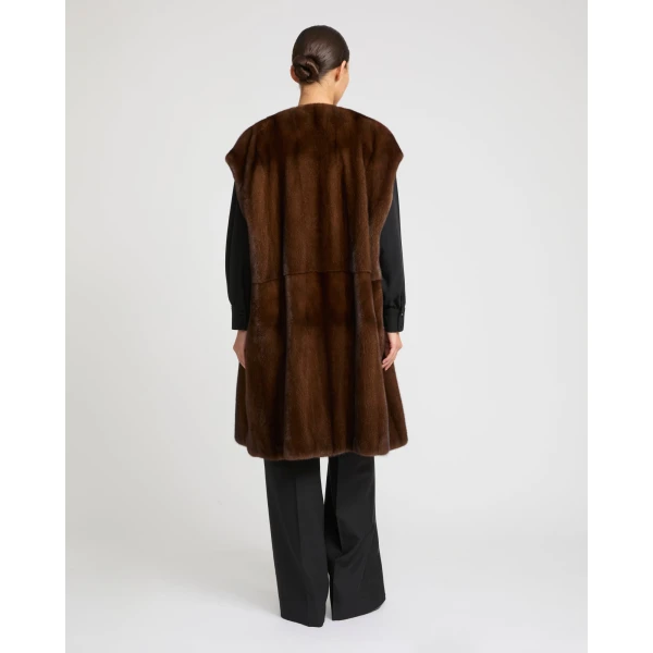 Woman wearing Yves Salomon shearling fur coat – luxury outerwear at Luxury Shoes 