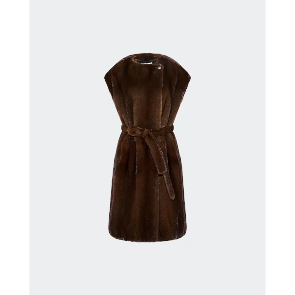 Woman wearing Yves Salomon shearling fur coat – luxury outerwear at Luxury Shoes 
