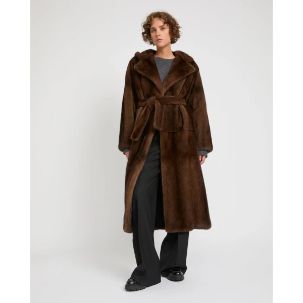 Woman wearing Yves Salomon shearling fur coat – luxury outerwear at Luxury Shoes 