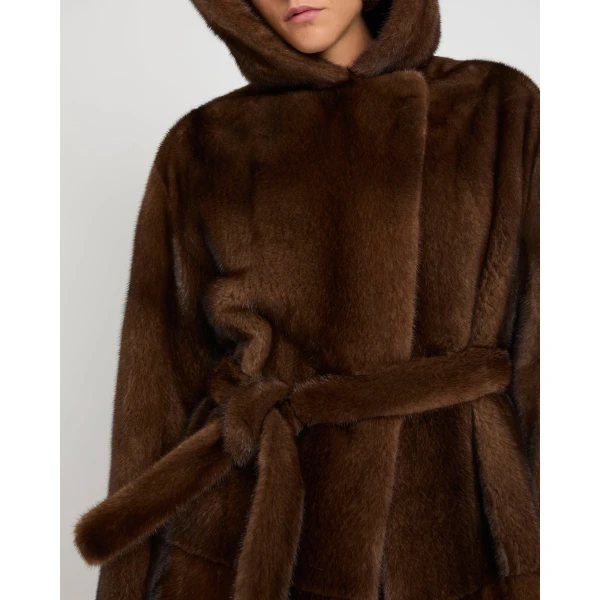 Woman wearing Yves Salomon shearling fur coat – luxury outerwear at Luxury Shoes 