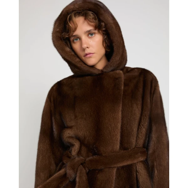 Woman wearing Yves Salomon shearling fur coat – luxury outerwear at Luxury Shoes 