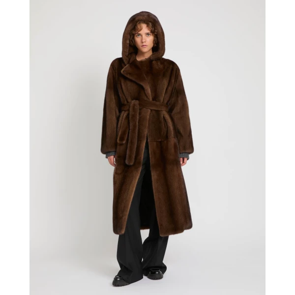 Woman wearing Yves Salomon shearling fur coat – luxury outerwear at Luxury Shoes 