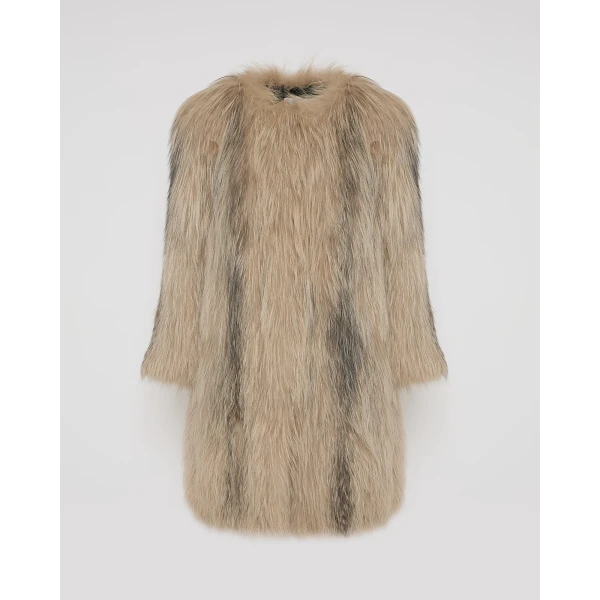 Woman wearing Yves Salomon shearling fur coat – luxury outerwear at Luxury Shoes 