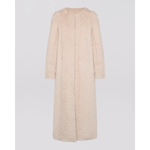 Woman wearing Yves Salomon shearling fur coat – luxury outerwear at Luxury Shoes 