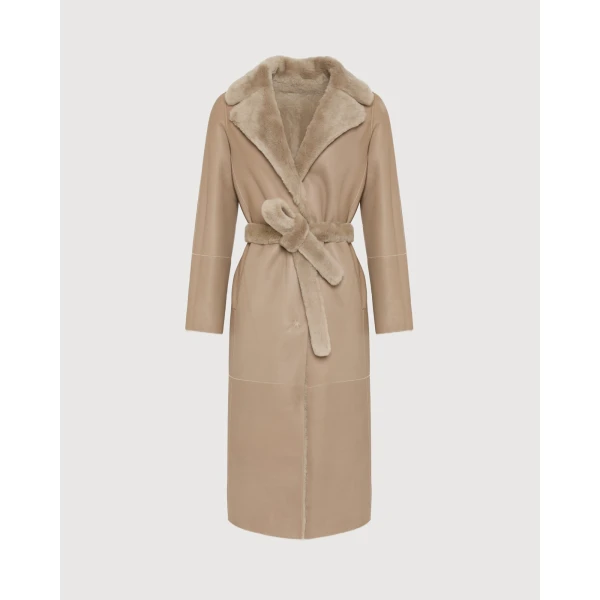 Woman wearing Yves Salomon shearling fur coat – luxury outerwear at Luxury Shoes 