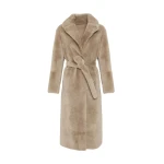 Woman wearing Yves Salomon shearling fur coat – luxury outerwear at Luxury Shoes 