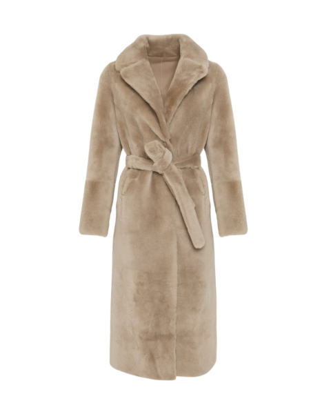 Woman wearing Yves Salomon shearling fur coat – luxury outerwear at Luxury Shoes 
