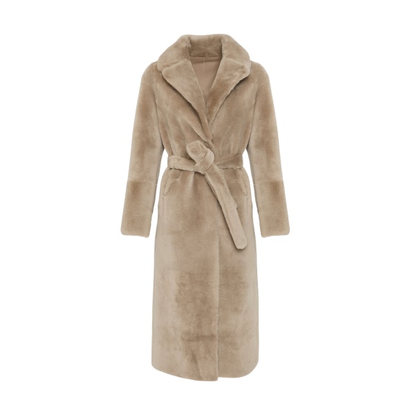 Woman wearing Yves Salomon shearling fur coat – luxury outerwear at Luxury Shoes 