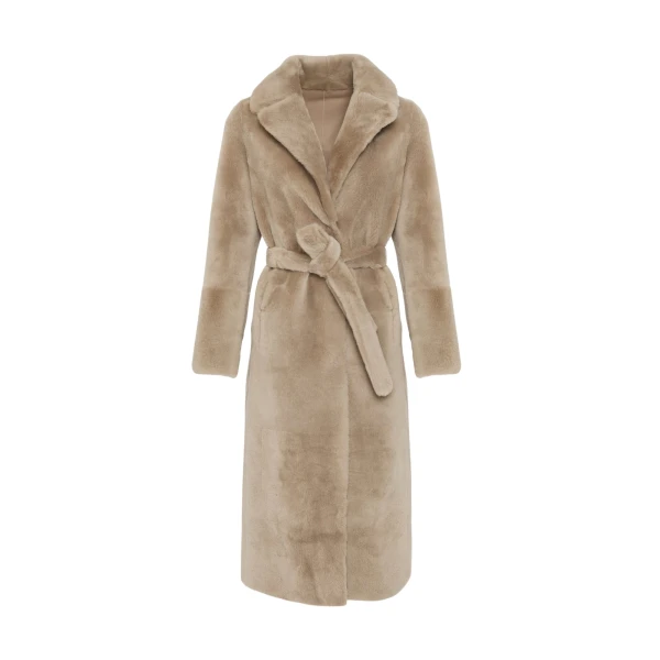 Woman wearing Yves Salomon shearling fur coat – luxury outerwear at Luxury Shoes 