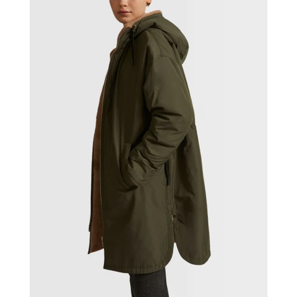 Woman wearing Yves Salomon shearling fur coat – luxury outerwear at Luxury Shoes 