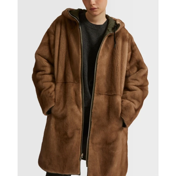 Woman wearing Yves Salomon shearling fur coat – luxury outerwear at Luxury Shoes 