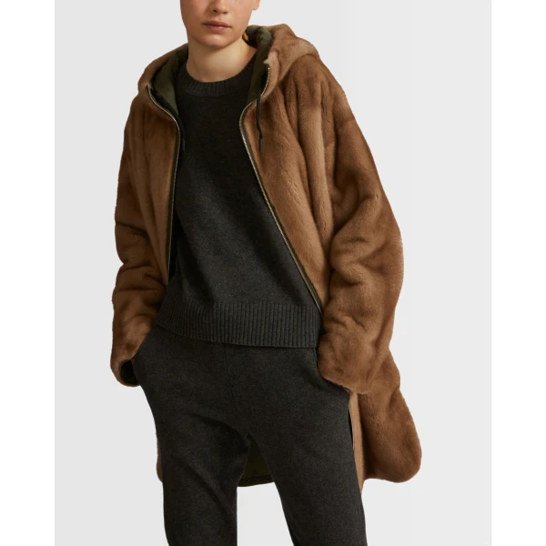Woman wearing Yves Salomon shearling fur coat – luxury outerwear at Luxury Shoes 