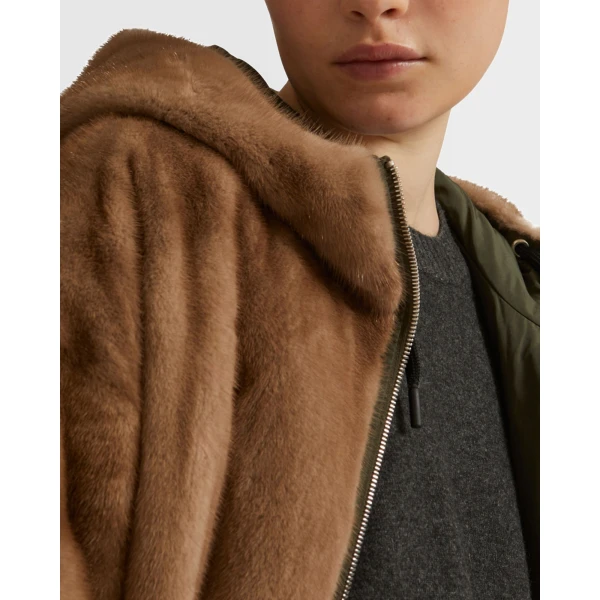 Woman wearing Yves Salomon shearling fur coat – luxury outerwear at Luxury Shoes 