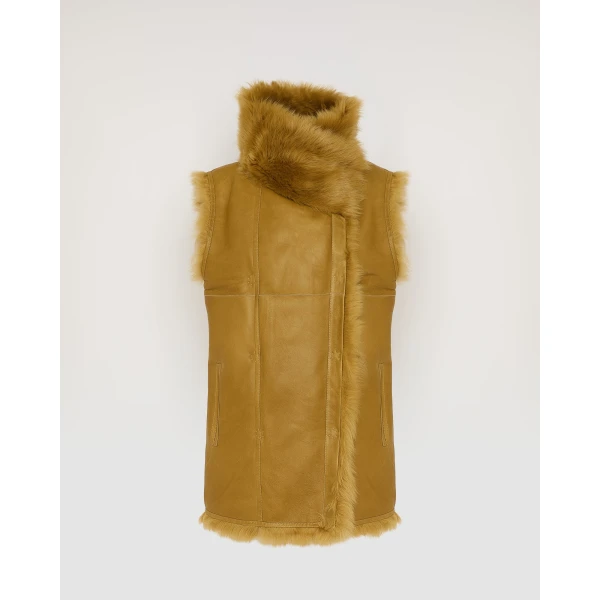 Woman wearing Yves Salomon shearling fur coat – luxury outerwear at Luxury Shoes 