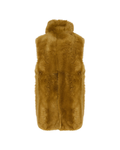 Woman wearing Yves Salomon shearling fur coat – luxury outerwear at Luxury Shoes 