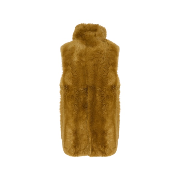 Woman wearing Yves Salomon shearling fur coat – luxury outerwear at Luxury Shoes 
