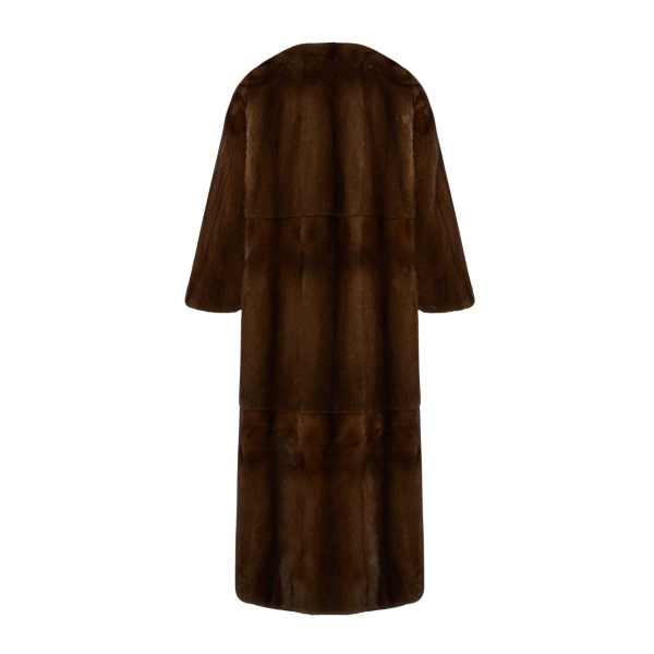 Woman wearing Yves Salomon shearling fur coat – luxury outerwear at Luxury Shoes 
