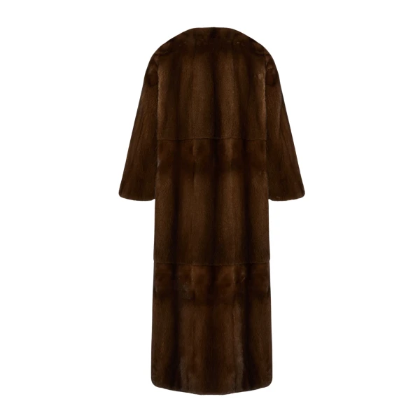 Woman wearing Yves Salomon shearling fur coat – luxury outerwear at Luxury Shoes 