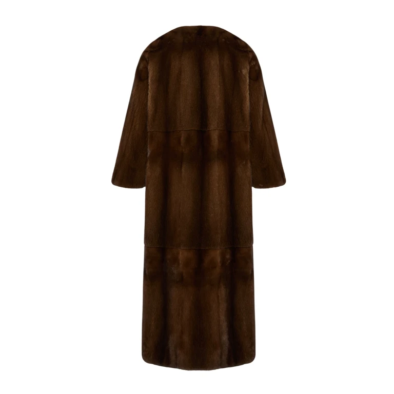 Woman wearing Yves Salomon shearling fur coat – luxury outerwear at Luxury Shoes 
