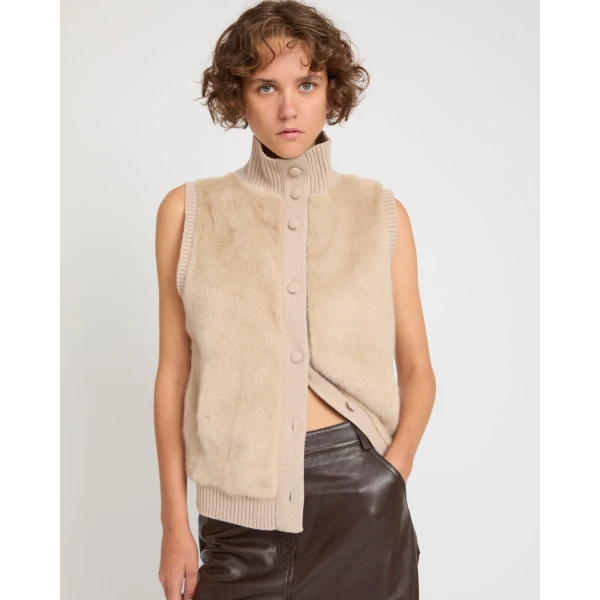 Woman wearing Yves Salomon shearling fur coat – luxury outerwear at Luxury Shoes 