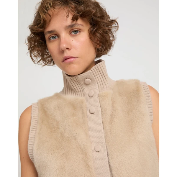 Woman wearing Yves Salomon shearling fur coat – luxury outerwear at Luxury Shoes 