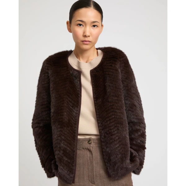 Woman wearing Yves Salomon shearling fur coat – luxury outerwear at Luxury Shoes 