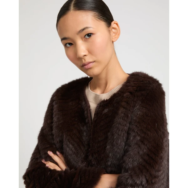 Woman wearing Yves Salomon shearling fur coat – luxury outerwear at Luxury Shoes 