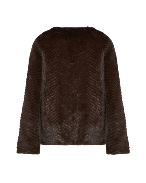 Woman wearing Yves Salomon shearling fur coat – luxury outerwear at Luxury Shoes 