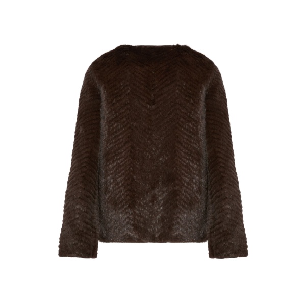 Woman wearing Yves Salomon shearling fur coat – luxury outerwear at Luxury Shoes 