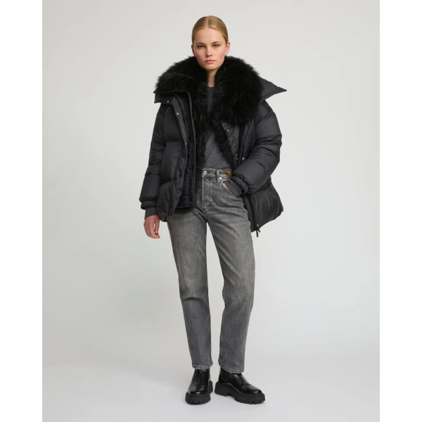 Woman wearing Yves Salomon shearling fur coat – luxury outerwear at Luxury Shoes 