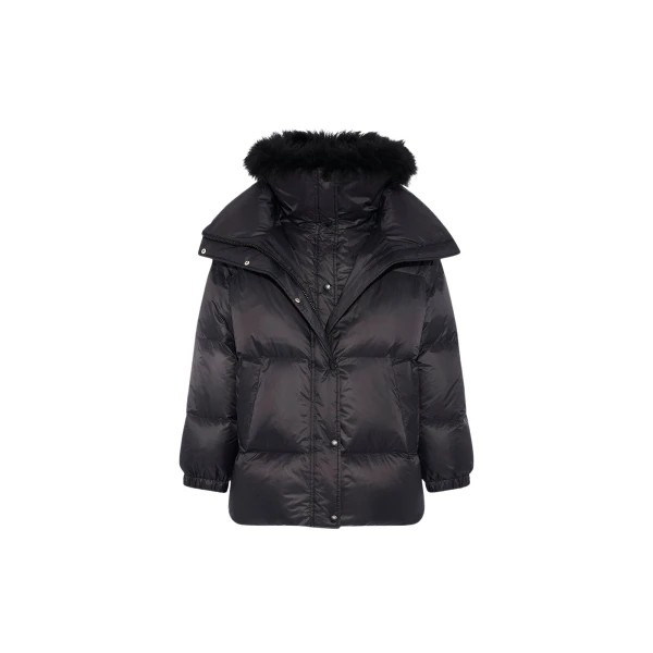 Woman wearing Yves Salomon shearling fur coat – luxury outerwear at Luxury Shoes 