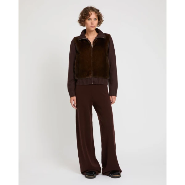Woman wearing Yves Salomon shearling fur coat – luxury outerwear at Luxury Shoes 