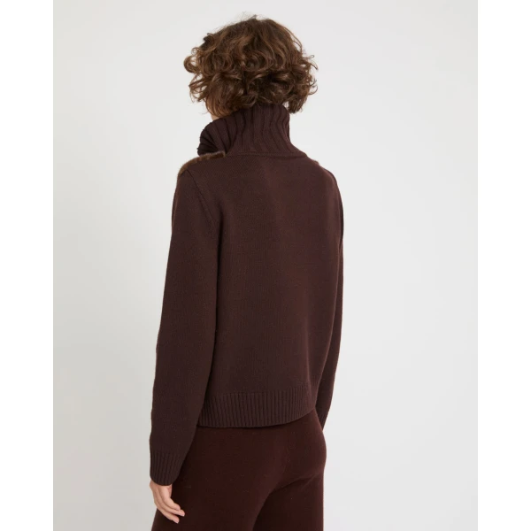 Woman wearing Yves Salomon shearling fur coat – luxury outerwear at Luxury Shoes 