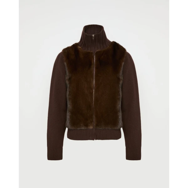 Woman wearing Yves Salomon shearling fur coat – luxury outerwear at Luxury Shoes 