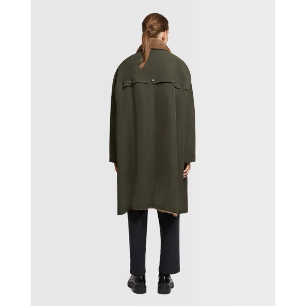Woman wearing Yves Salomon shearling fur coat – luxury outerwear at Luxury Shoes 