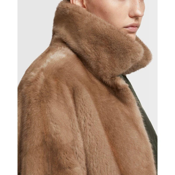 Woman wearing Yves Salomon shearling fur coat – luxury outerwear at Luxury Shoes 