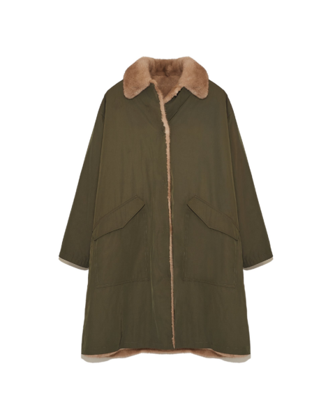 Woman wearing Yves Salomon shearling fur coat – luxury outerwear at Luxury Shoes 