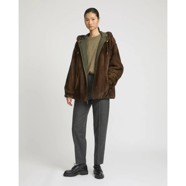Woman wearing Yves Salomon shearling fur coat – luxury outerwear at Luxury Shoes 