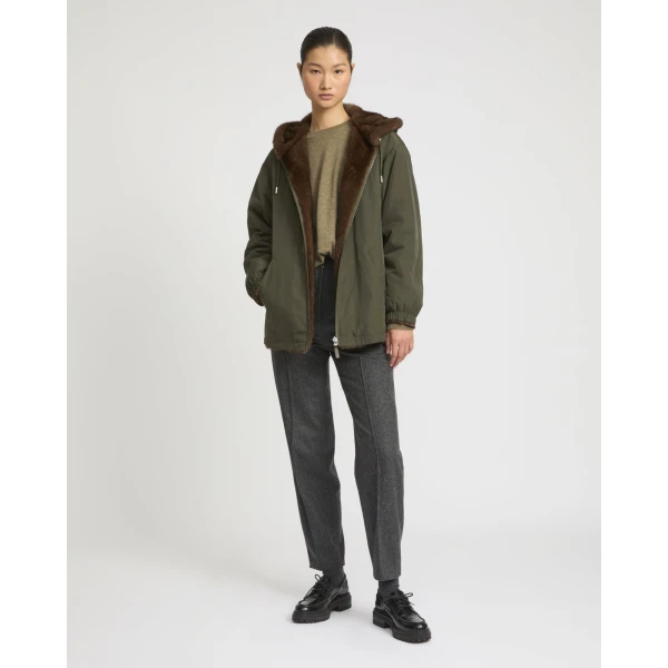 Woman wearing Yves Salomon shearling fur coat – luxury outerwear at Luxury Shoes 