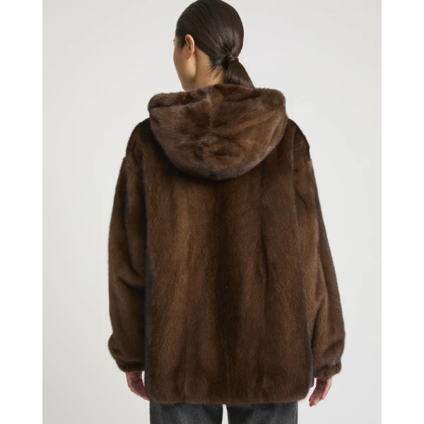Woman wearing Yves Salomon shearling fur coat – luxury outerwear at Luxury Shoes 