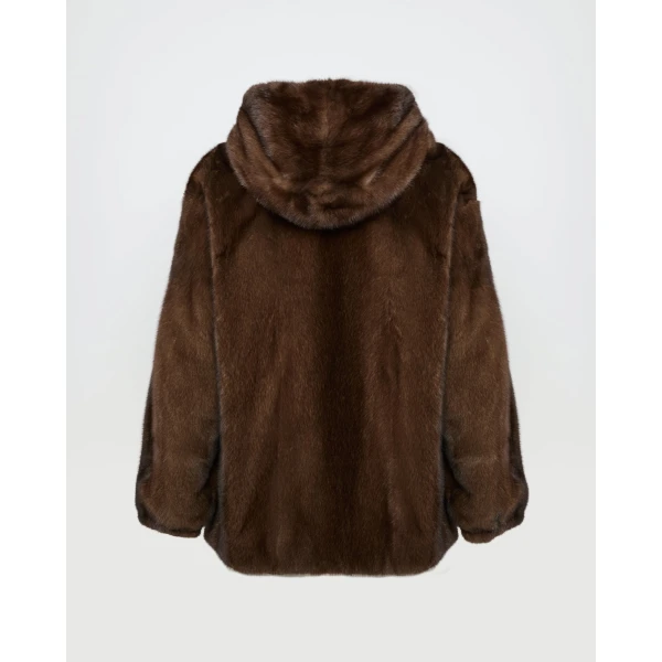 Woman wearing Yves Salomon shearling fur coat – luxury outerwear at Luxury Shoes 