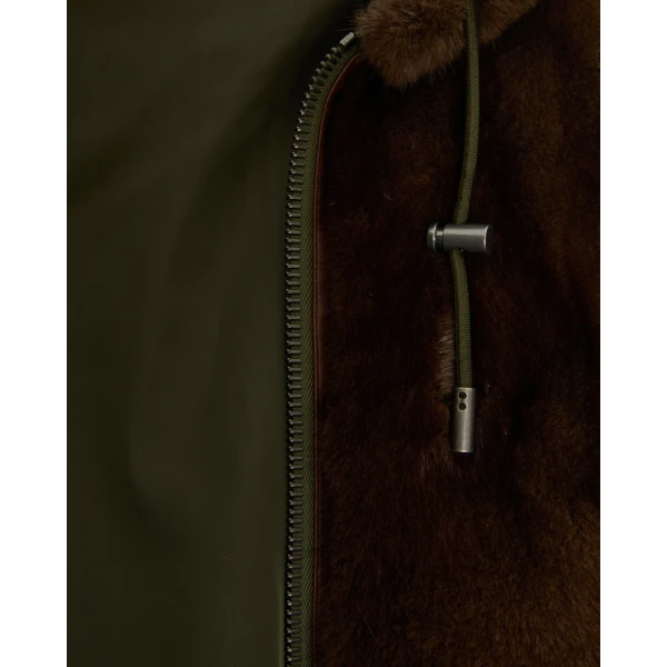 Woman wearing Yves Salomon shearling fur coat – luxury outerwear at Luxury Shoes 