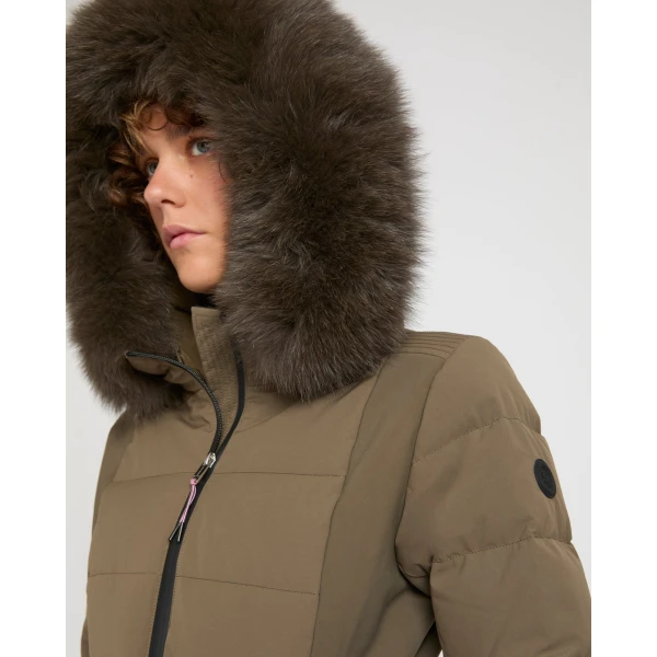 Woman wearing Yves Salomon shearling fur coat – luxury outerwear at Luxury Shoes 