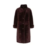 Woman wearing Yves Salomon shearling fur coat – luxury outerwear at Luxury Shoes 