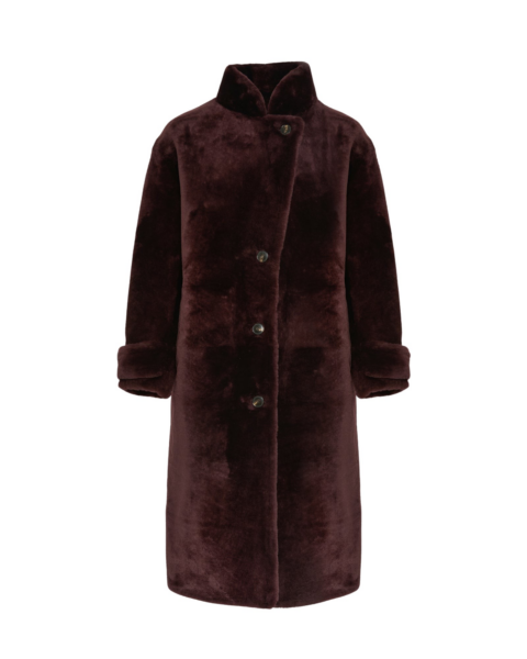 Woman wearing Yves Salomon shearling fur coat – luxury outerwear at Luxury Shoes 