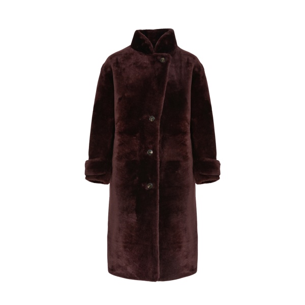 Woman wearing Yves Salomon shearling fur coat – luxury outerwear at Luxury Shoes 