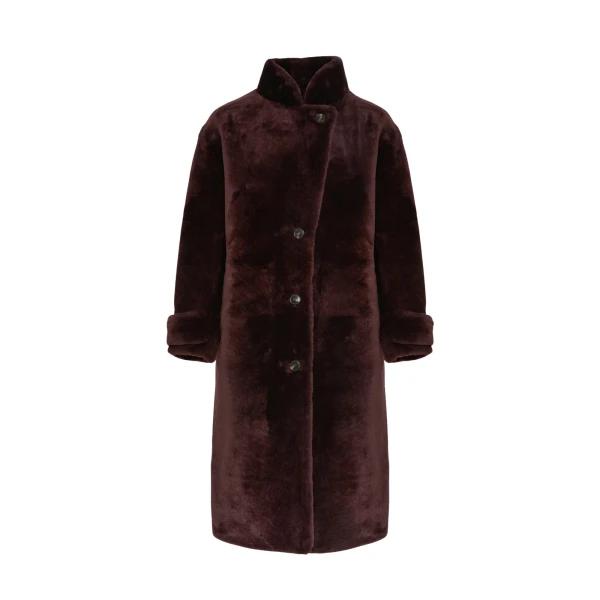 Woman wearing Yves Salomon shearling fur coat – luxury outerwear at Luxury Shoes 