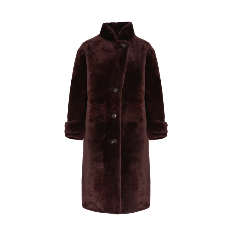 Woman wearing Yves Salomon shearling fur coat – luxury outerwear at Luxury Shoes 